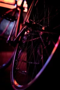 a close up of a bike tire in a dark room