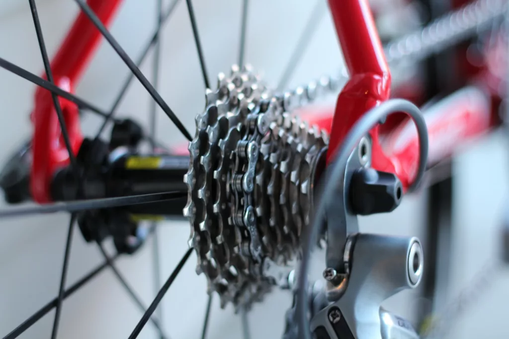 selective focus photo of bicycle part cassette