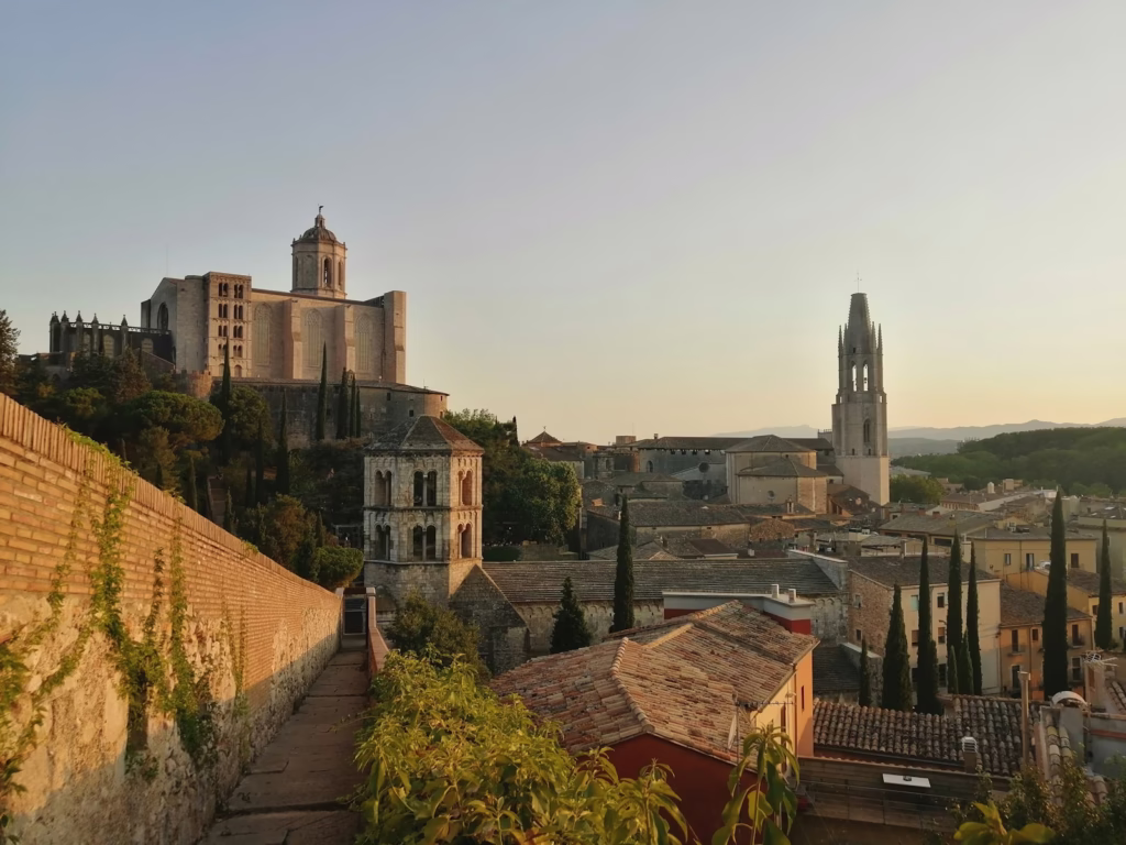 a city with a brick wall Girona