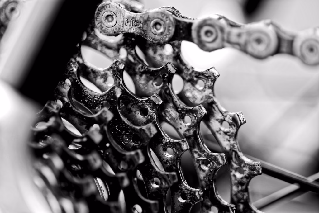grayscale photo of bicycle derailleur