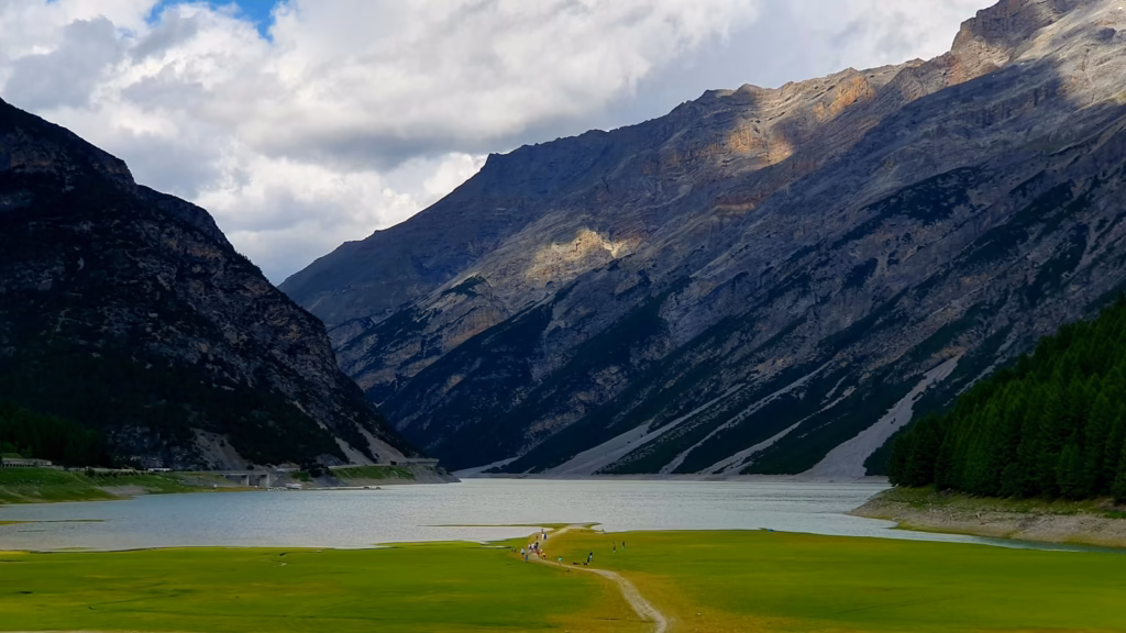 a scenic view of a lake and mountains