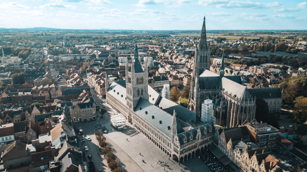 Ypres An aerial view of a city with tall buildings