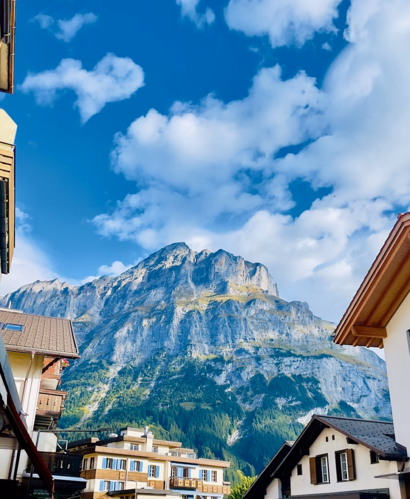 Bernese Oberland: Interlaken, Grindelwalda mountain is in the distance behind a row of buildings