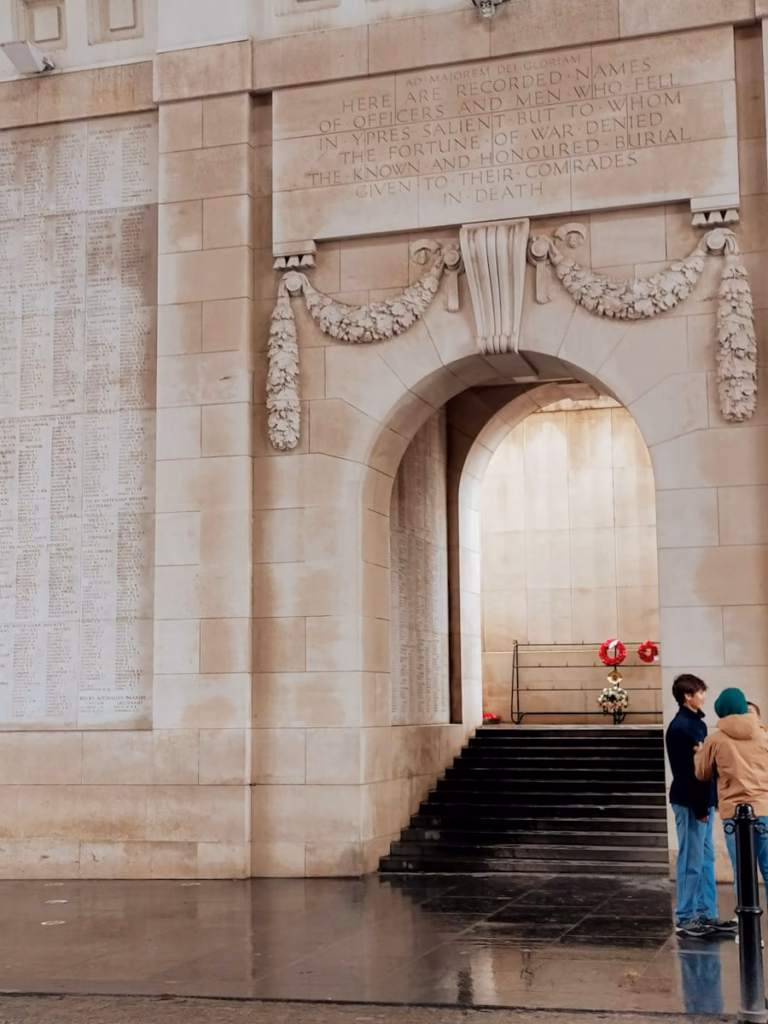 Ypres a couple of people standing in front of a building