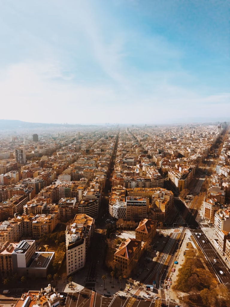 an aerial view of Barcelona with tall buildings
