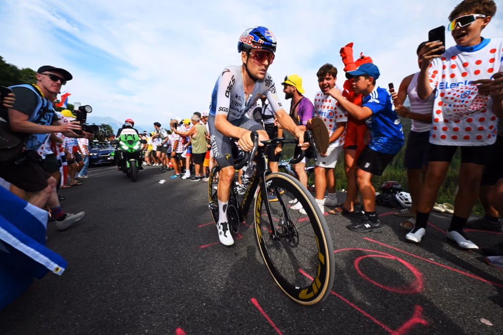 Tom-Pidcock-fined-docked-10-seconds-and-KOM-points-for-pushing-off-a-car-twice-on-Tour-de-France-Stage-15
