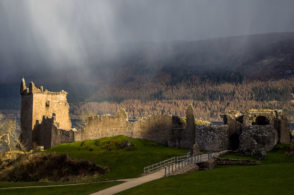 Loch Ness brown castle near green field and brown trees