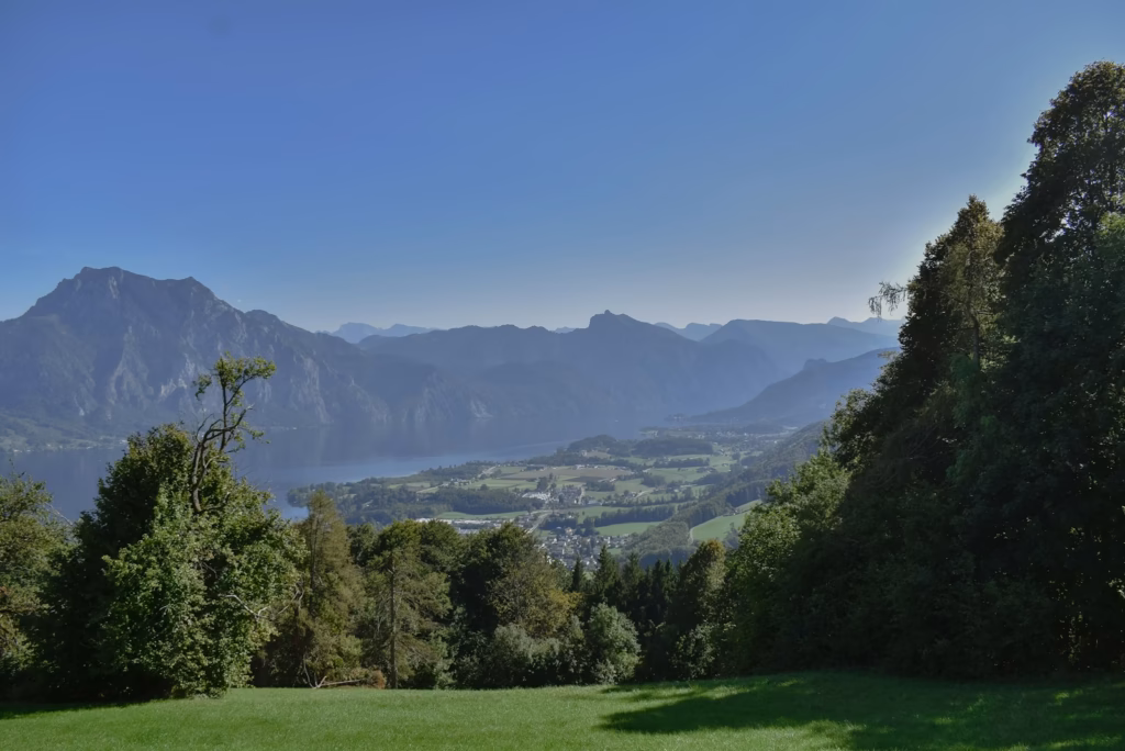 Salzburg a view of a valley and mountains from a distance