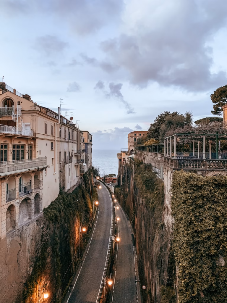 Sorrento white and brown concrete building under white clouds during daytime
