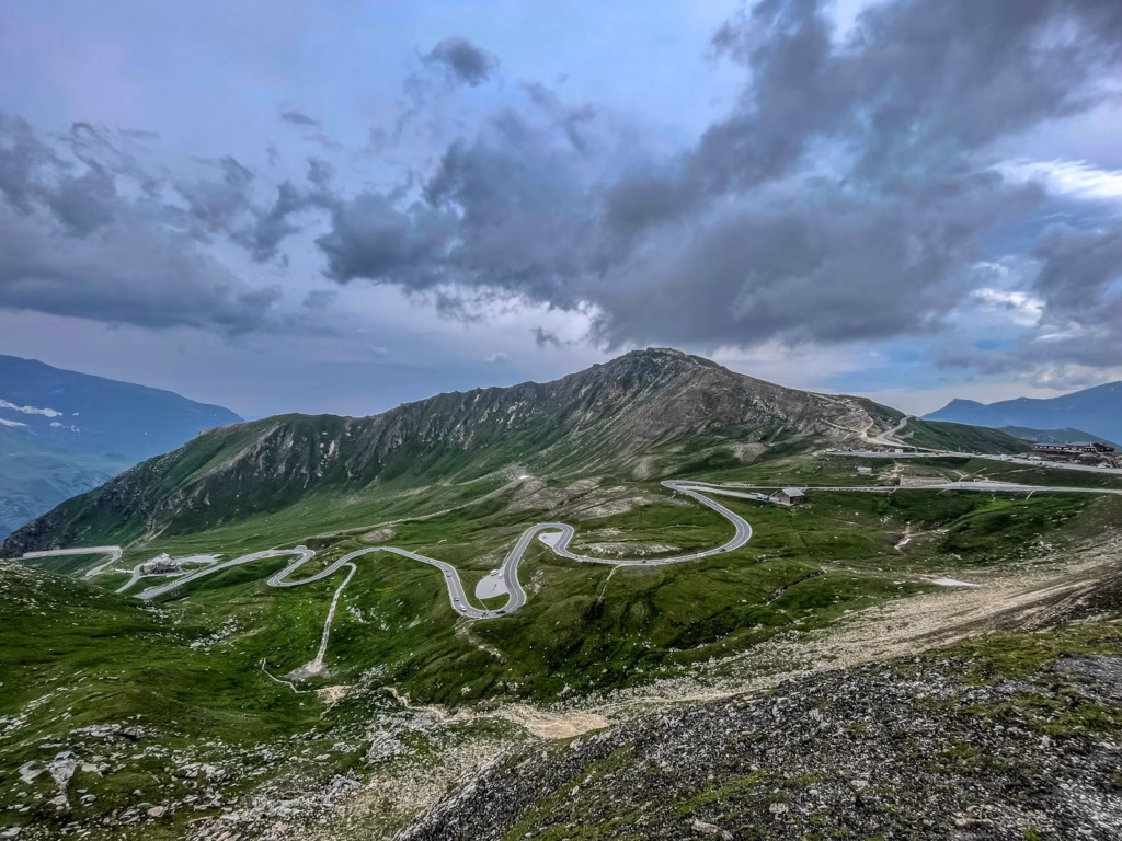 Grossglockner a winding road in the mountains under a cloudy sky