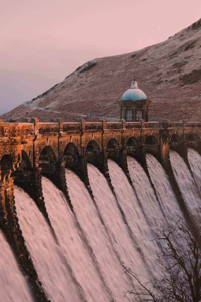 Elan Valley Dam blue and white dome building on top of gray mountain