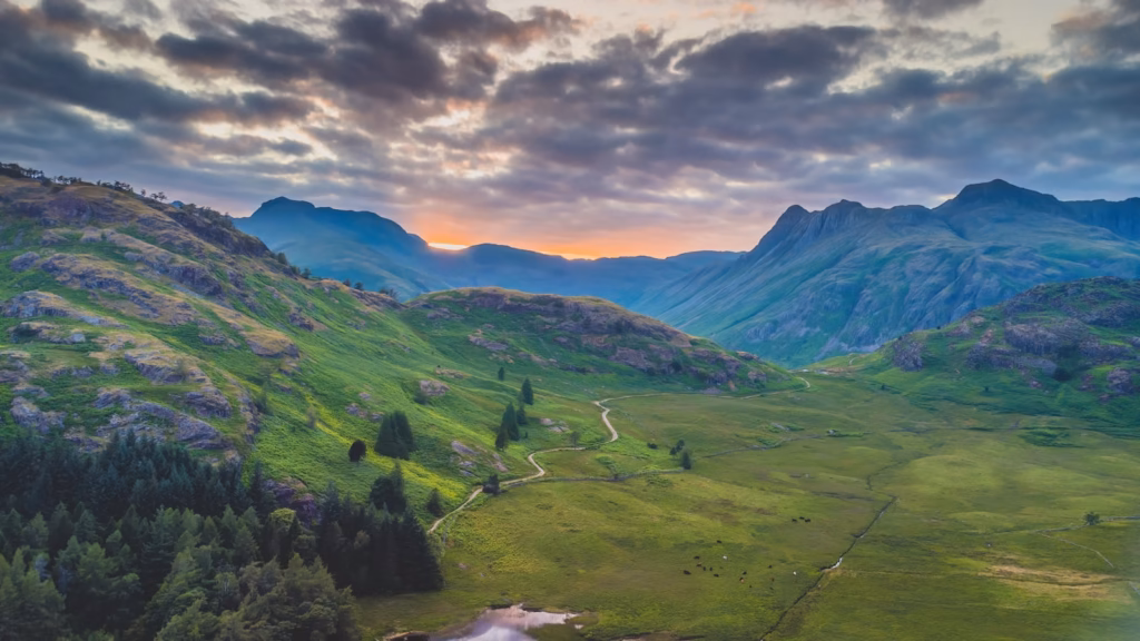 Lake District green mountains under white clouds during daytime