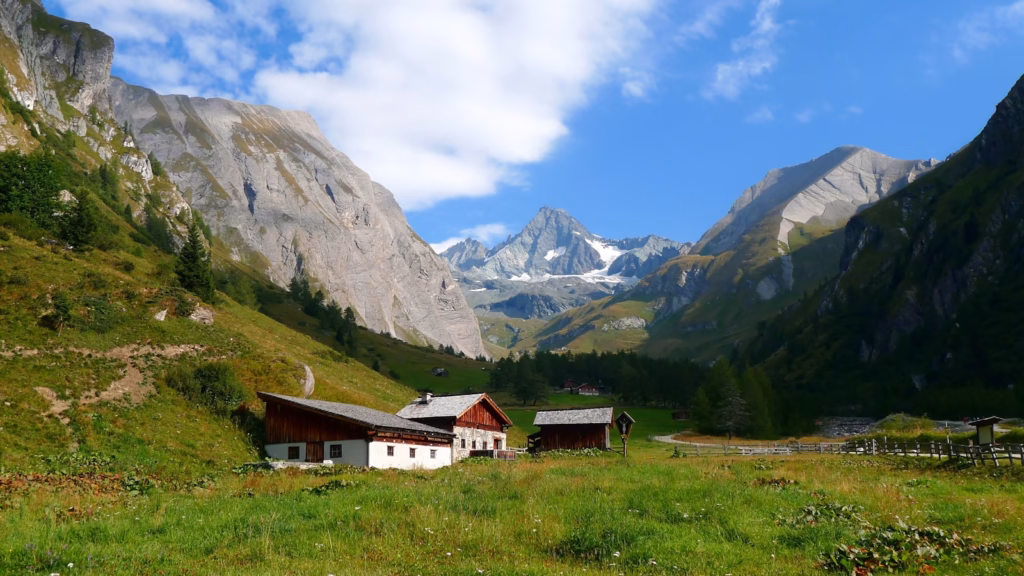 Grossglockner red and white house and barn near mountains