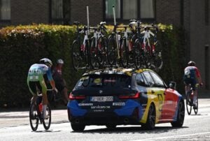 Jonathan-Milan-ordered-to-pull-over-as-race-leader-is-lapped-by-peloton-following-huge-crash-at-Renewi-Tour
