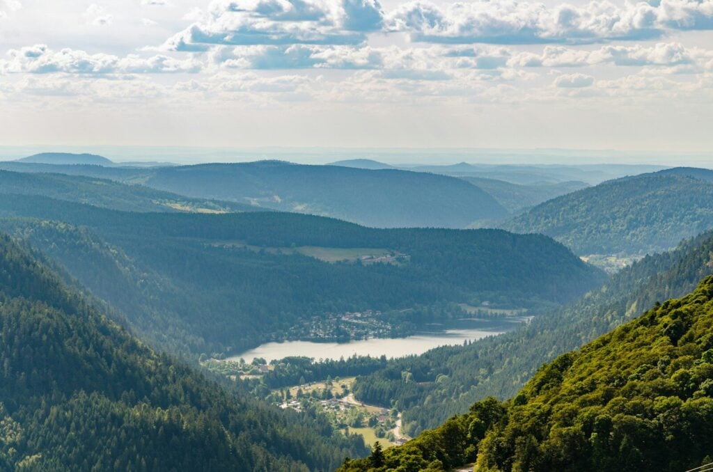 Vosges green mountains under white clouds during daytime