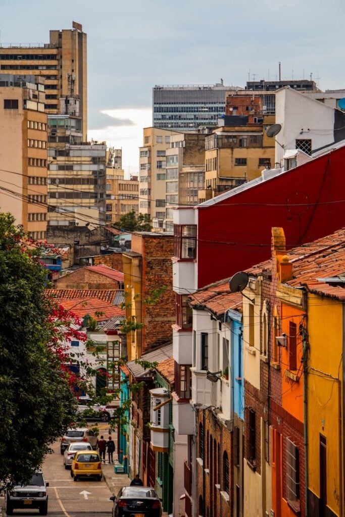 Bogota a city street filled with lots of tall buildings