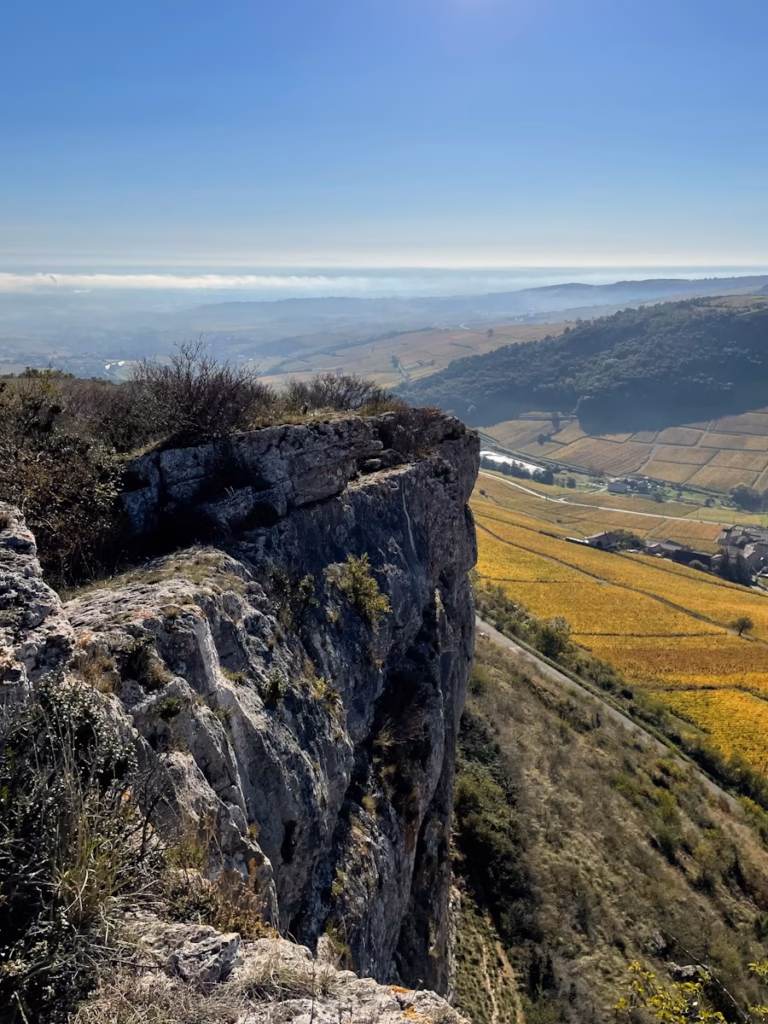 Beaujolais Wine Region a person standing on top of a cliff