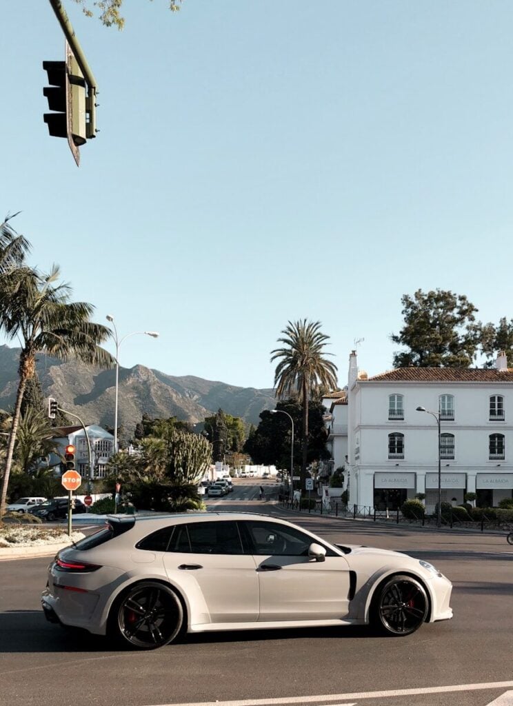 Marbella white 5-door hatchback on concrete pavement