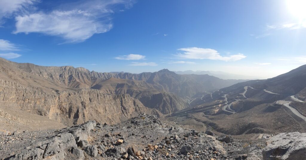 Jebel Jais brown rocky mountain under blue sky during daytime