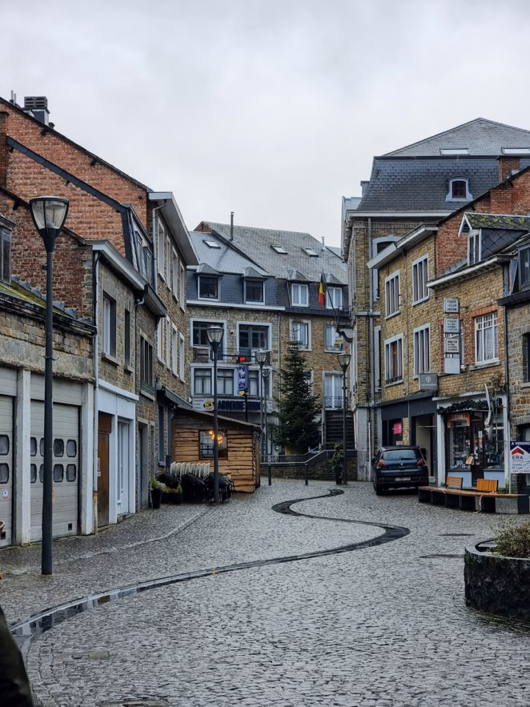 La Roche-en-Ardenne a cobblestone street with buildings on either side of it