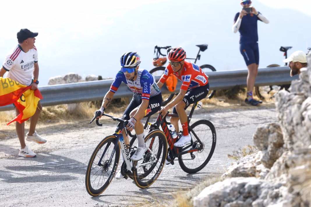 How much time does Primož Roglič need to take from Enric Mas in the Vuelta time trial?