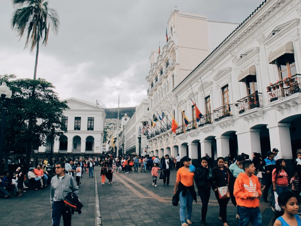 Quito people walking beside building at daytime