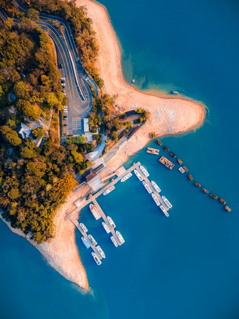 Sun Moon Lake Taiwan an aerial view of a boat dock on a lake