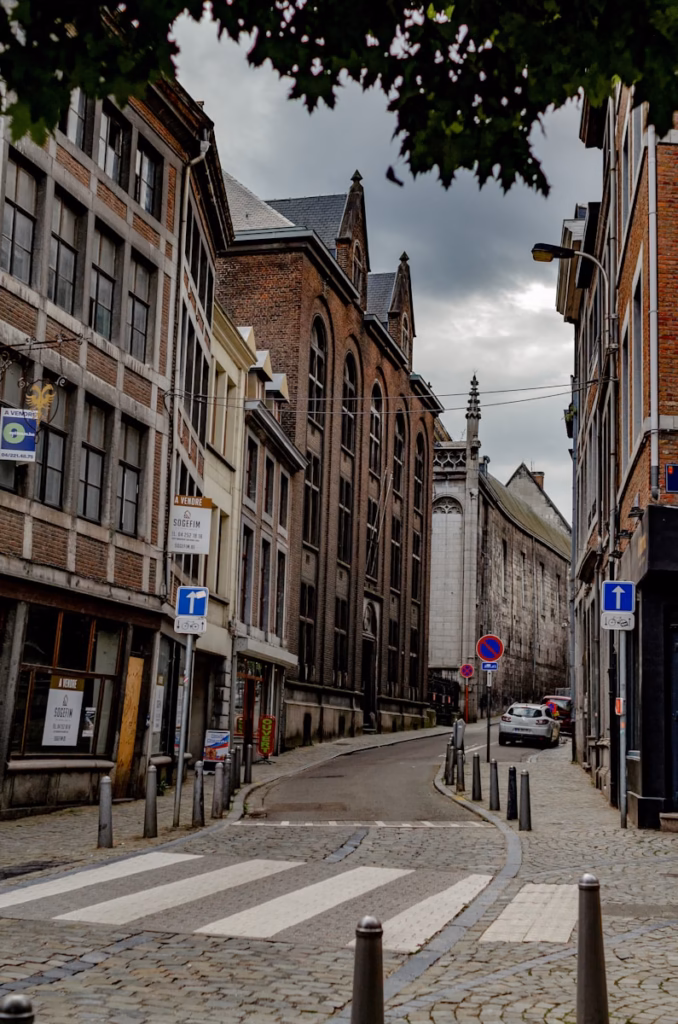 Liege Street A cobblestone street lined with tall brick buildings